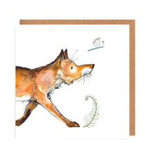 Load image into Gallery viewer, Square white greetings card featuring watercolour and pencil illustration of a fox walking onto the page, looking up at a dragonfly. The card is laid on top of a matching brown envelope. 