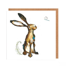 Load image into Gallery viewer, Square white greetings card featuring an ink illustration of Molly Hare looking up at a dragonfly. The card has no message and comes with a matching brown envelope. 