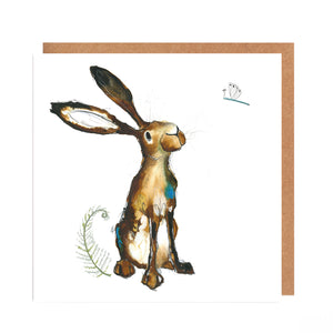 Square white greetings card featuring an ink illustration of Molly Hare looking up at a dragonfly. The card has no message and comes with a matching brown envelope. 