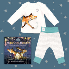 Load image into Gallery viewer, Baby gift set featuring a book from the Molly, Olive and Dexter series by Catherine Rayner, &#39;Who&#39;s Afraid of the Dark?&#39; and a matching fox pyjama set laid on a midnight blue backdrop with silver stars. The pyjama set comprises a white long-sleeved top featuring an illustrated wraparound fox print and matching bottoms with blue cuffs.