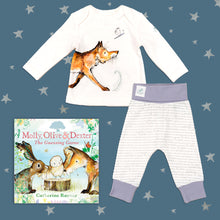 Load image into Gallery viewer, Baby gift set featuring a book from the Molly, Olive and Dexter series by Catherine Rayner, &#39;The Guessing Game&#39; and a matching fox pyjama set laid on a midnight blue backdrop with silver stars. The pyjama set comprises a white long-sleeved top featuring an illustrated wraparound fox print and matching bottoms with purple cuffs.