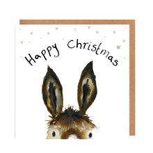 Load image into Gallery viewer, Square white Christmas card featuring an ink illustration of a Trevor the donkey&#39;s eyes and ears peeking over the edge of the card, surrounded by stars, and handwritten &#39;Happy Christmas&#39; message.