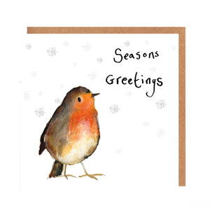 Square white Christmas card featuring watercolour and pencil illustration of a robin surrrounded by snowflakes, and handwritten 'Seasons Greetings' message.