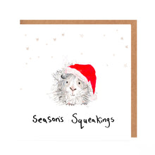 Load image into Gallery viewer, Square white Christmas card featuring watercolour and pencil illustration of a guinea pig wearing a Christmas hat, surrounded by stars, and handwritten &#39;Season&#39;s Squeakings&#39; message.