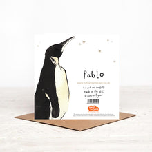 Load image into Gallery viewer, The reverse side of Pablo Penguin Christmas card, featuring a penguin illustration and details of charity Christmas partner Read for Good. 