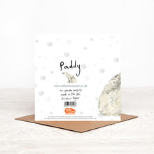 Load image into Gallery viewer, The reverse side of Paddy Polar Bear Christmas card featuring handwritten &#39;Paddy&#39; and details of Christmas charity partner Read for Good. 